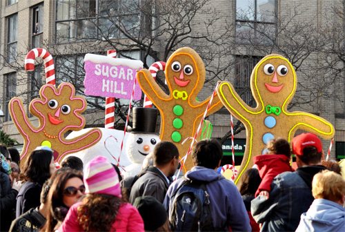 Gingerbread men pass through the St. Lawrence Neighbourhod in the 108th Santa Claus Parade.
