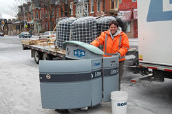 City worker delivers new bins (Photo: Cabbagetown BIA)