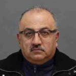  Razgar Hasan, 56, charged with Sexual Assault and Breach of Trust