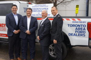 Pictured left to right: Matthew Fisher and Curtis Vickers, president and treasurer of Toronto Area Ford Dealer Association; Mike Herniak, general manager, Ford of Canada; Andrew Burditt, divisional secretary of public relations, The Salvation Army.
